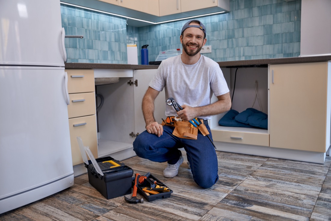 Licensed Northgate plumber at work in a home